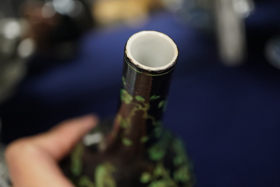 A Chinese famille noire bottle vase, 17cm high